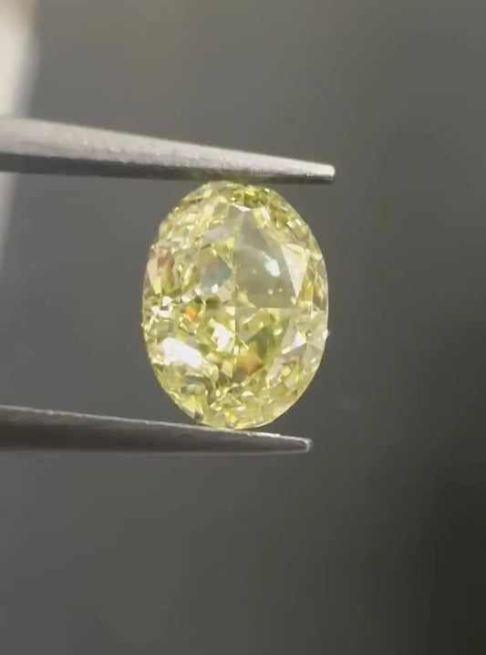 0.60ct Oval Natural Diamond (Colour Fancy Light Yellow, Clarity VVS1, Cut GD, GIA Certified)
