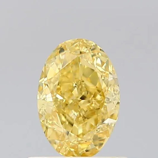 0.74ct Oval Lab Grown Diamond (Colour Fancy Vivid Yellow, Clarity VVS2, IGI Certified)