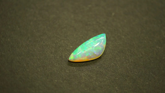 2.37ct Trilliant Natural Opal (Colour Multicolor, Clarity Moderately Included, Cut Cabochon)