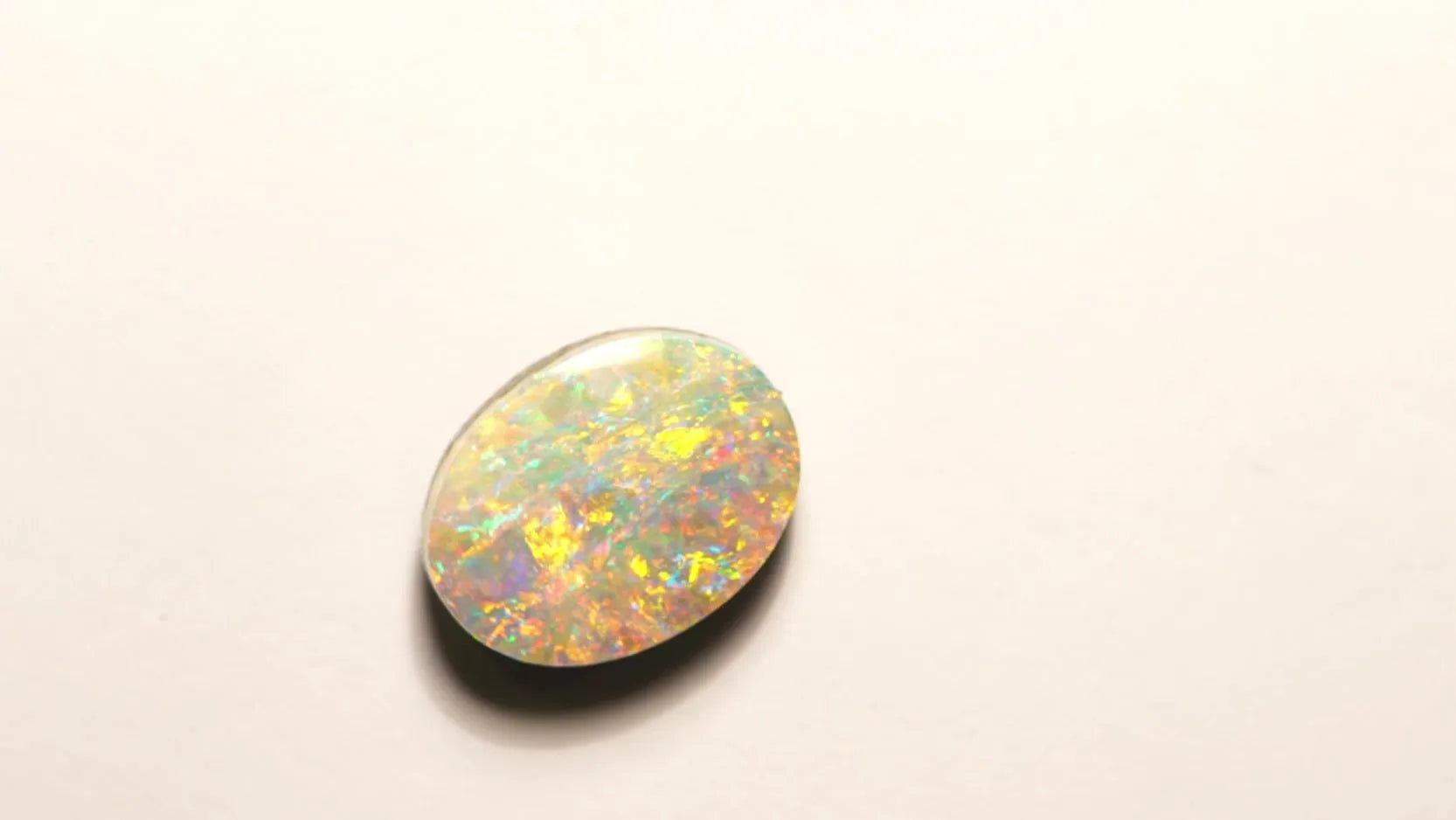 3.54ct Oval Natural Opal (Colour Multicolor, Clarity Visibly Included, Cut Cabochon)
